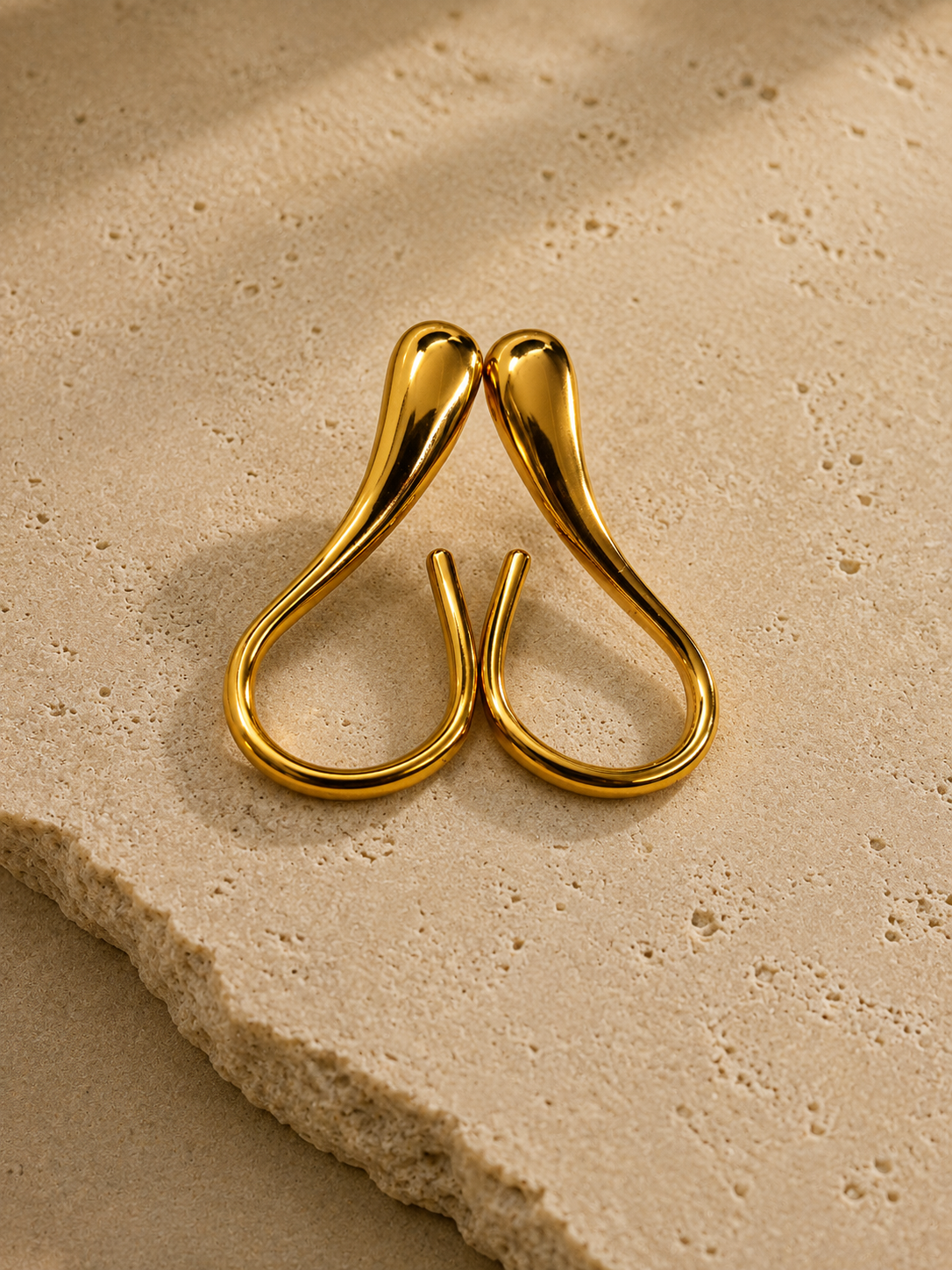 Gold-tone abstract open-hoop statement earrings, front view