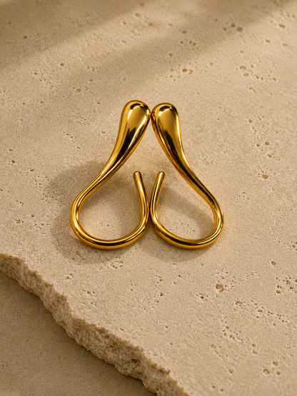 Gold-tone abstract open-hoop statement earrings, front view