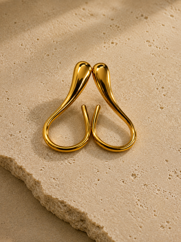 Gold-tone abstract open-hoop statement earrings, front view