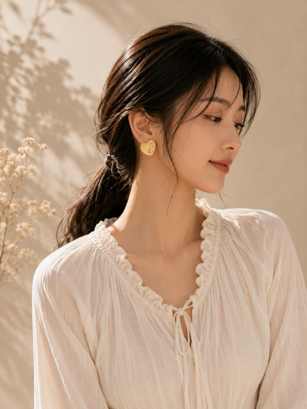 Women’s Heart-Shaped Gold Stud Earrings