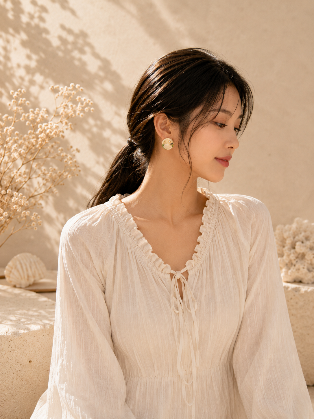 Seashell and pearl statement stud earrings, detailed view