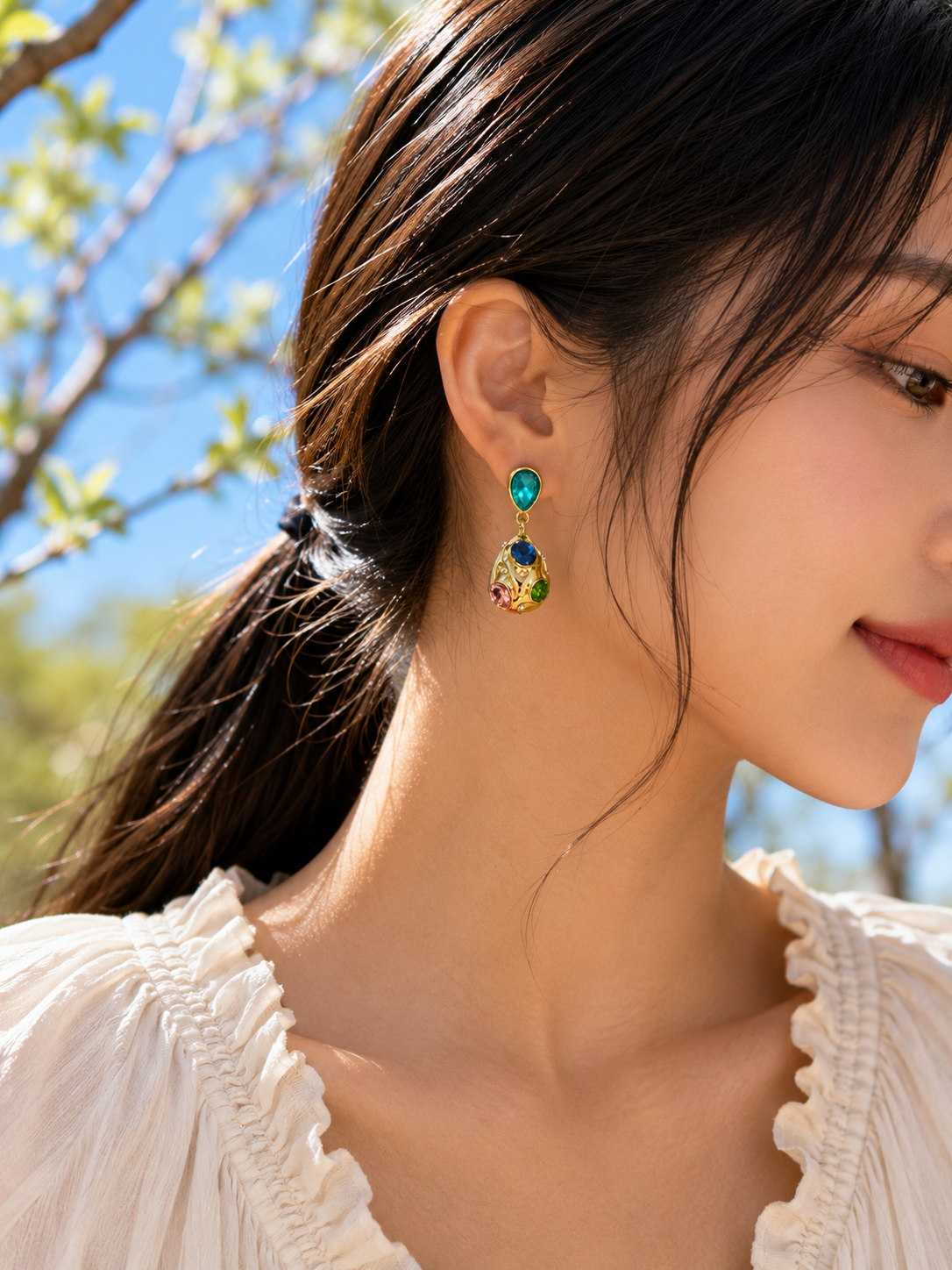 Gold-tone drop earrings with turquoise, blue, green and pink stones