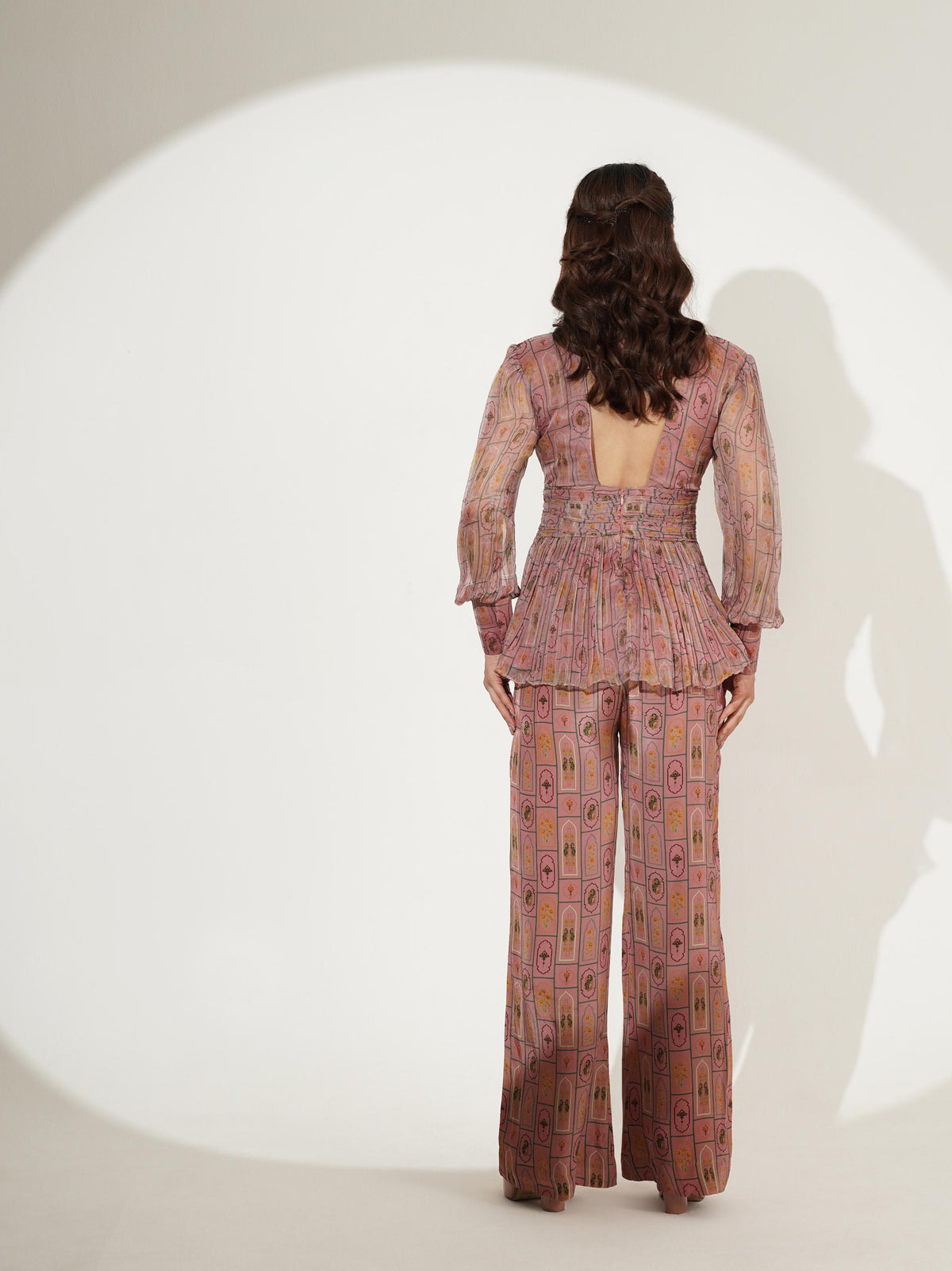 Blush pink embellished peplum co-ord set showing back view