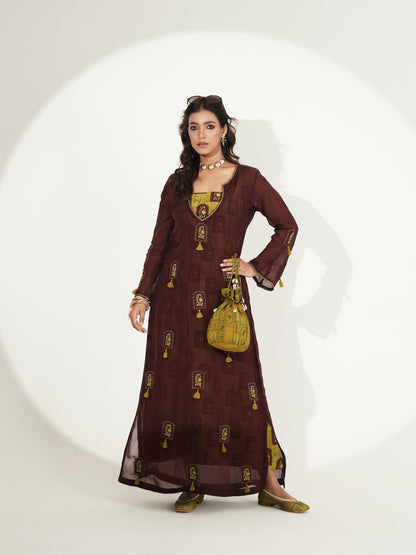 Deep brown fusion set showing embroidered neckline and tassels