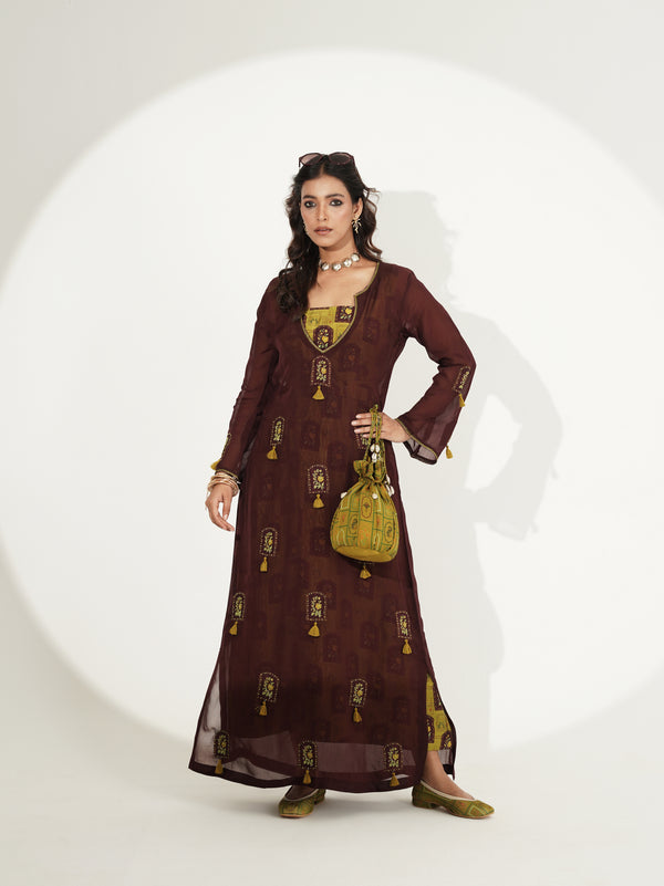 Deep brown fusion set showing embroidered neckline and tassels