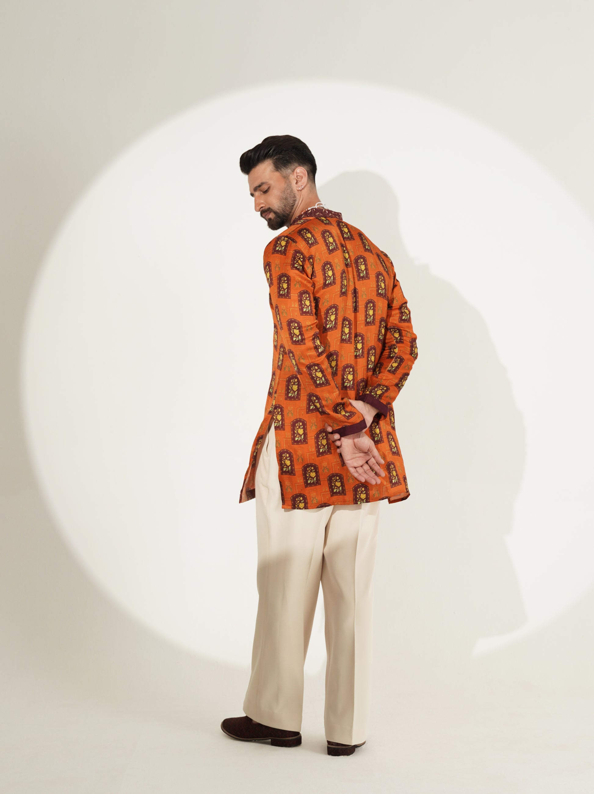 Burnt-orange printed kurta set, front view