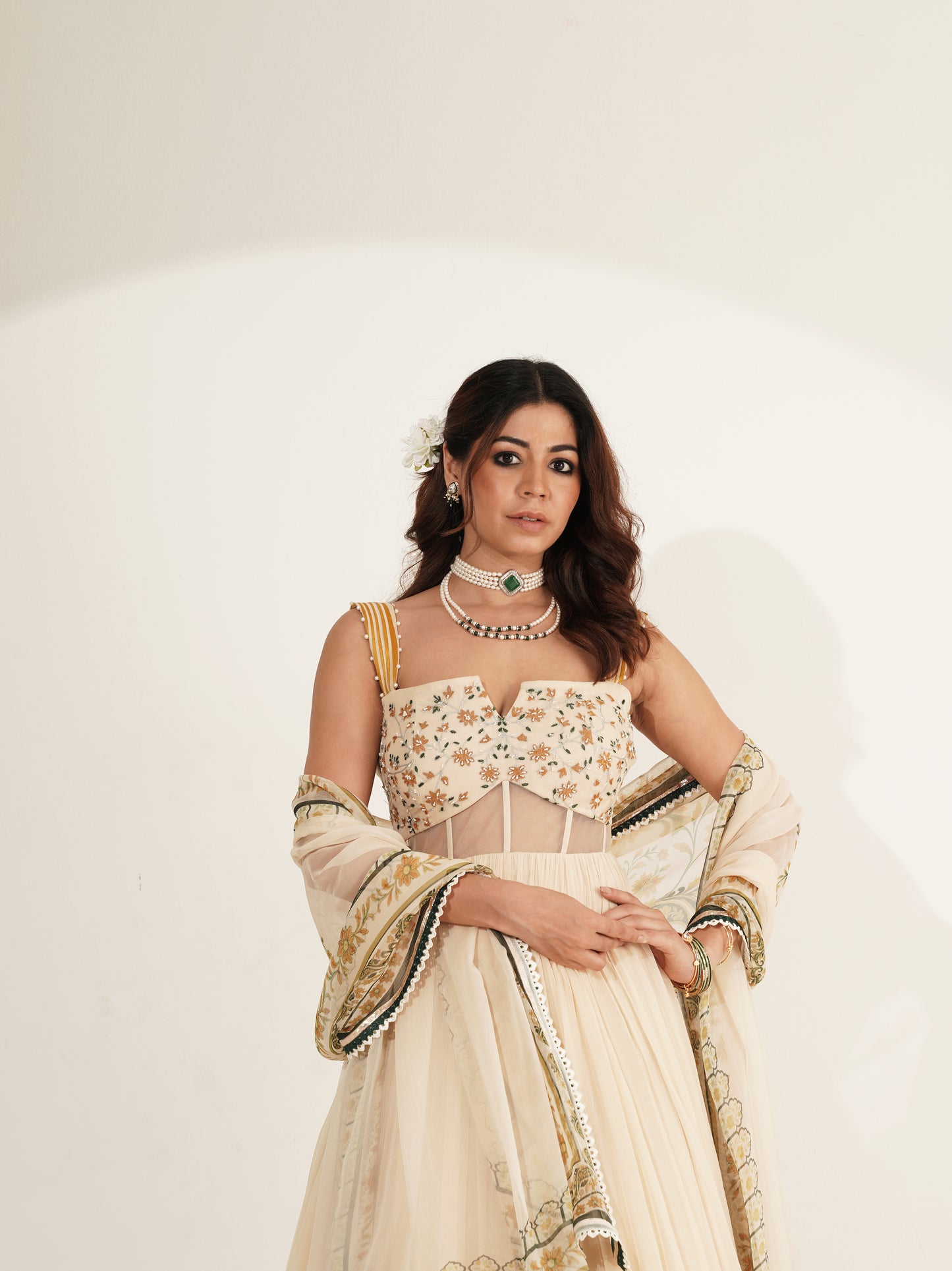 Ivory and mustard ombré lehenga set showing back view