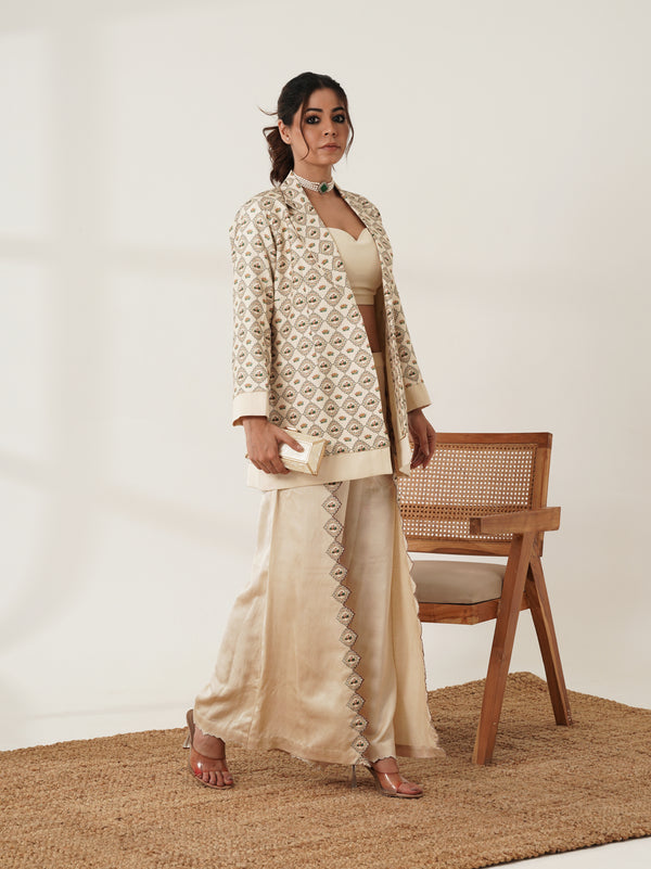 Beige co-ord set showing printed jacket and bustier detail