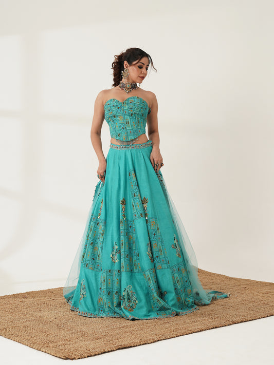 Turquoise printed lehenga set showing embellished dupatta