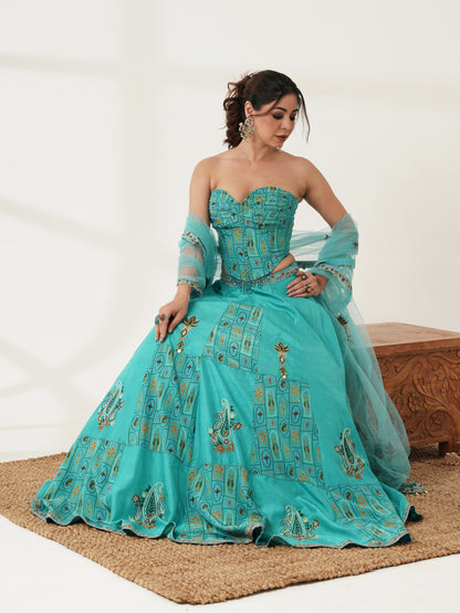 Turquoise printed strapless lehenga set, back view