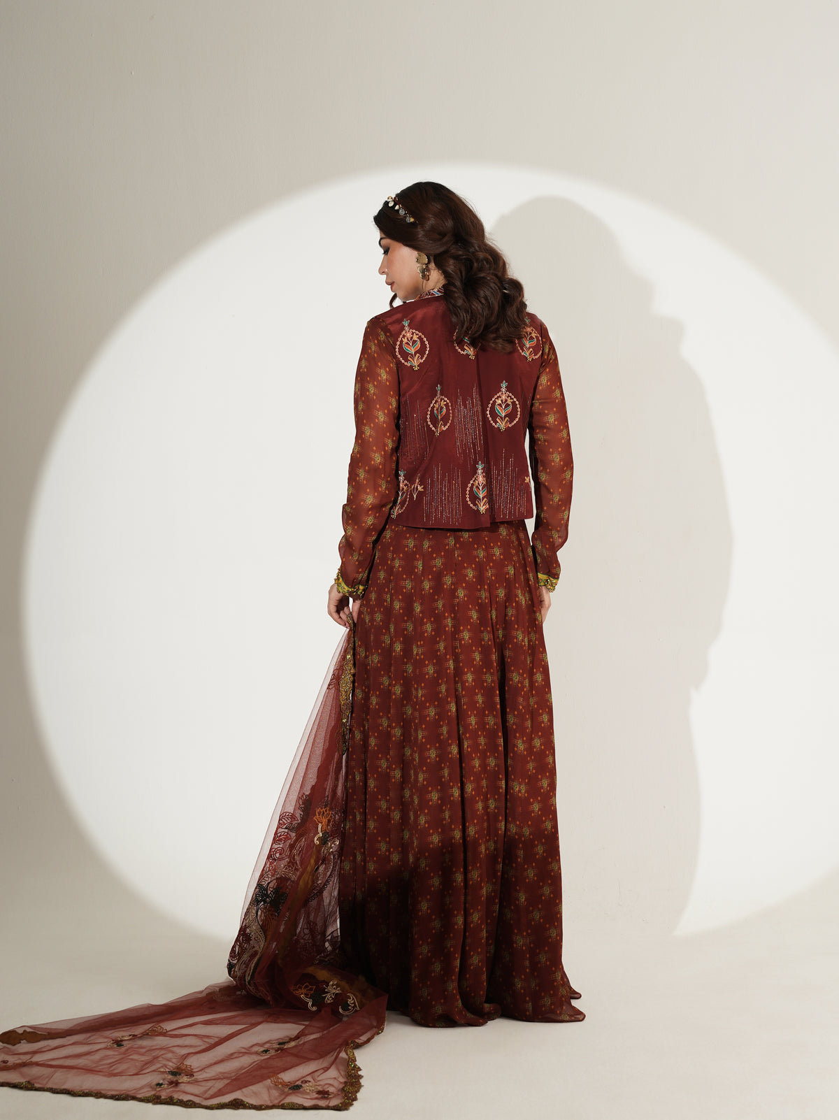 Rust brown Anarkali set showing jacket and neckline details