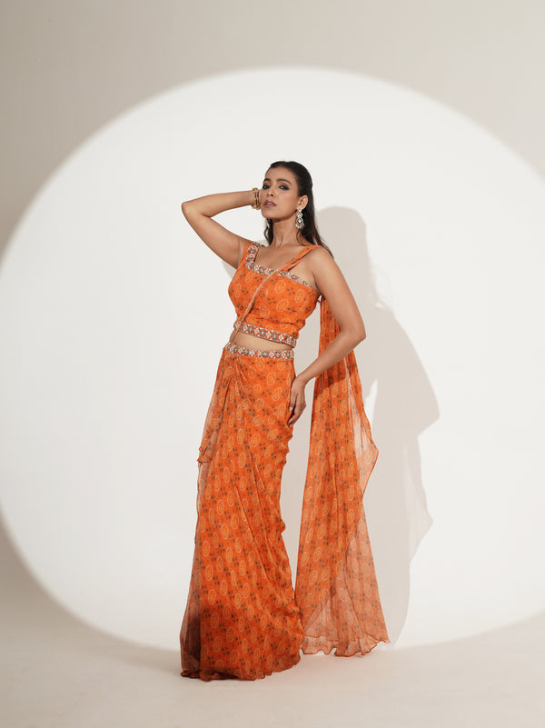 Orange printed draped saree set, side view