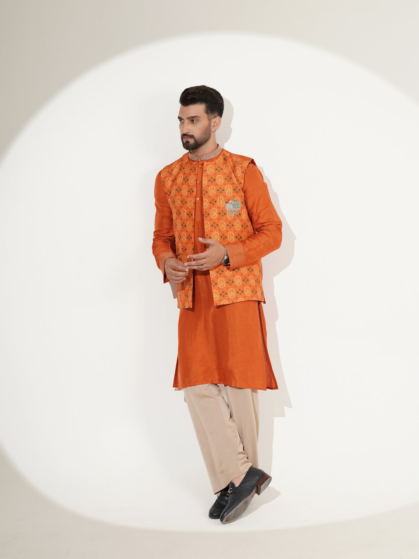 Burnt-orange kurta and printed jacket set, side view