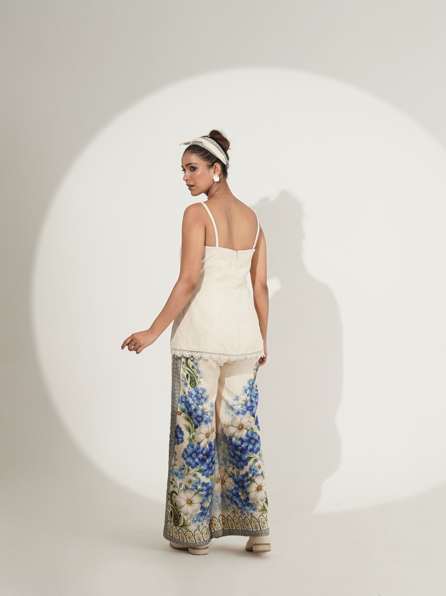 Blue floral co-ord set showing back view and palazzo print