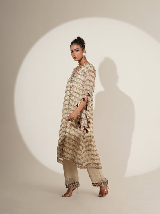 Beige Angrakha kurta showing printed overlap and tassels